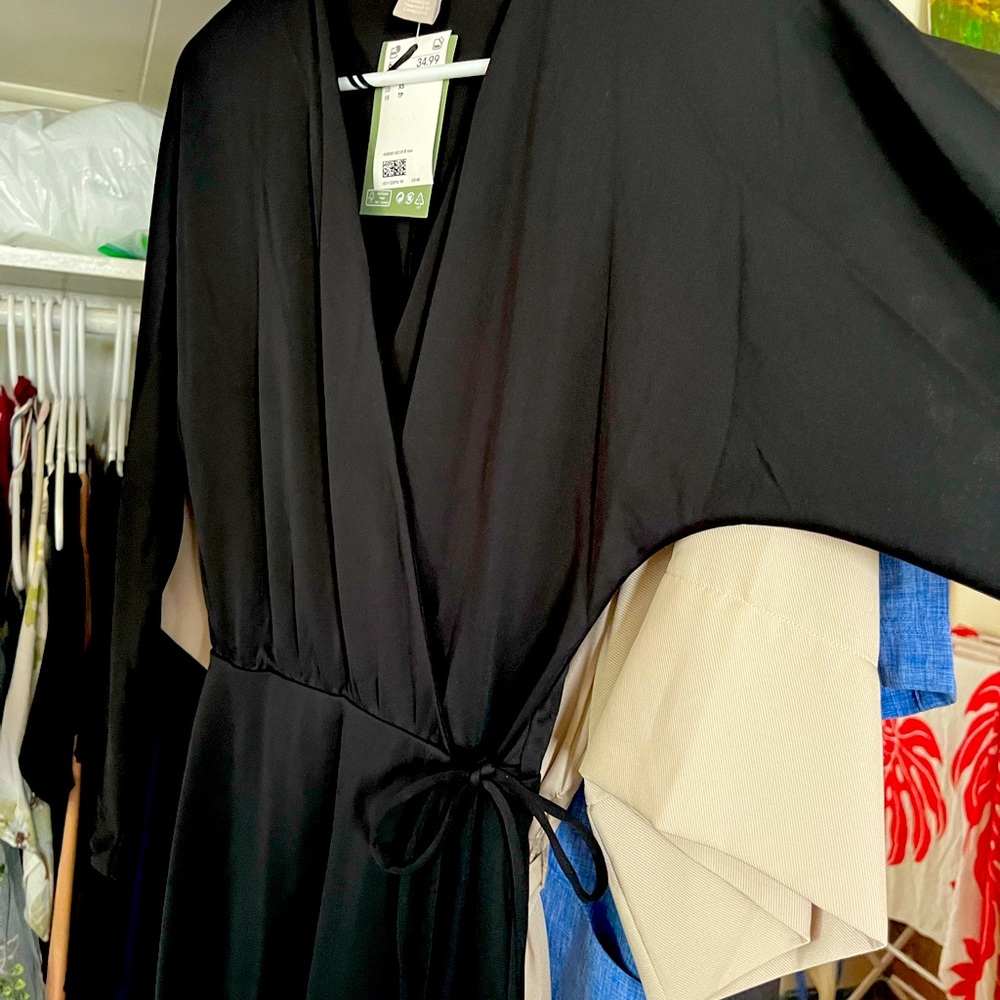 H&M crape black dress. Tied in front.  XS brand new.